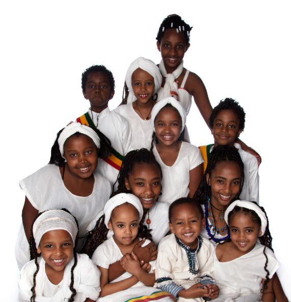 Large group of Ethiopian children in traditional costumes