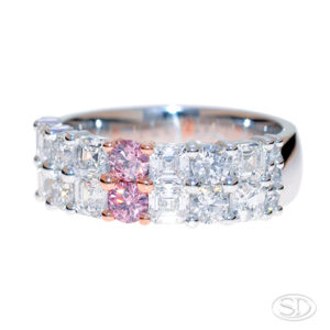 pink diamond ring with asscher cut, white diamonds, two-third view