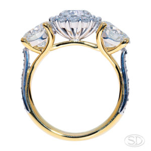 three stone diamond engagement ring, side view