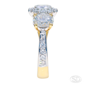 three stone diamond engagement ring, side view