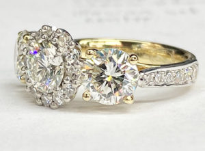 three stone diamond engagement ring, two-third view, in our jewellery workshop