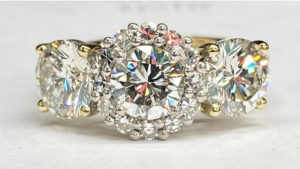 three stone diamond engagement ring, front view, in our jewellery workshop