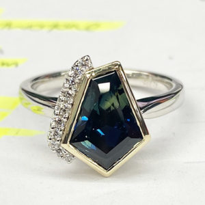 asymmetrical cut, Australian-sapphire ring with diamonds down one side